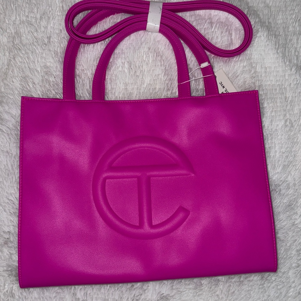 Brand new never used Telfar Shopping bag in Medium Azalea; retail for $202